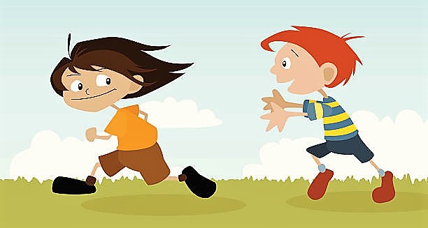A boy and a girl playing chase.